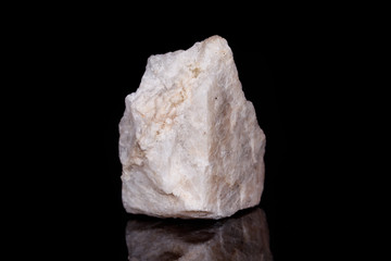 Macro mineral stone Wollastonite on black background