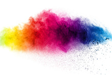 Abstract Multi Color Powder Explosion On White Background.  Freeze Motion Of  Dust  Particles Splashing. Painted Holi In Festival