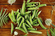 © dyageleva - Fresh Green peas. Top view. Pea on wooden background