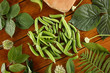© dyageleva - Fresh Green peas. Top view. Pea on wooden background