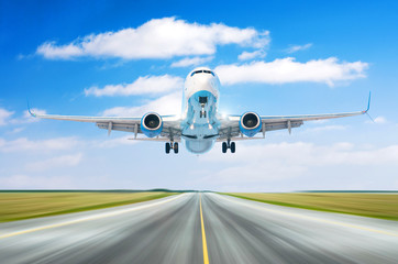 Poster - Airplane aircraft with split-scimitar wing flying departure landing speed motion on a runway in the good weather with cumulus clouds sky day.