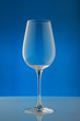 empty wineglass/ empty wineglass on blue background