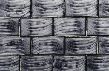 Wall Mural - Grey tiles background.