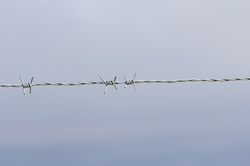 Barbed wire fence