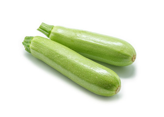 Fresh green Zucchini vegetables  isolated on white background.