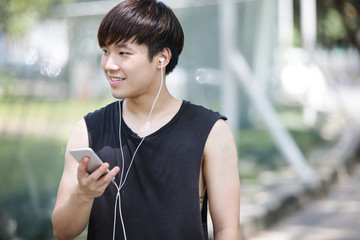 Wall Mural - Young asian man exercise