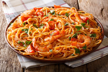 Tomato Fra Diavolo Sauce, Seafood And Pasta Spaghetti Close-up. Horizontal