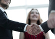 © ASDF - Businessmen handshaking after good deal. Business concept