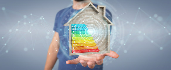 Wall Mural - businessman using 3d rendering energy rating chart in a wooden house