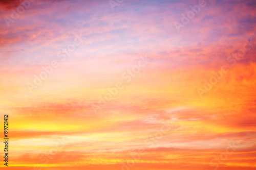 orangel landscape with sky, clouds and sunrise