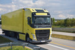 LKW auf einer Straße beim Transport von Waren - Logitsik und Spedition // Trucks on a road transporting goods - logistics and forwarding