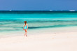 © TravelPhotoBloggers - Adorable little girl at beach