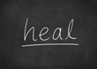 heal concept word on a blackboard background