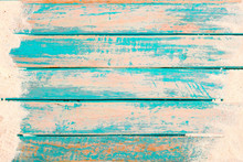 Beach Background - Top View Of Beach Sand On Old Wood Plank In Blue Sea Paint Background. Summer Vacation Concept. Vintage Color Tone.