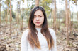 © themorningglory - Hipster indy asian women stading in park forest