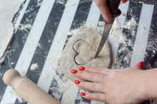 Woman Carved Heart From Dough For Cookies, She Have Nice Red Nails.