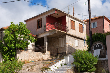 Wall Mural - Typical small greek house on a sunny summer day at Keri village, Zakynthos island, Greece.