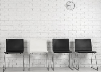 Sticker - Waiting room interior with row of chairs. Job interview