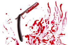 Dangerous Razor And Blood Traces On A White Background