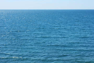Wall Mural - Blue calm Mediterranean Sea. Texture for the background.
