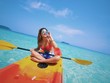 © chayathon2000 - Asian beautiful girl kayaking on the beach in Andaman sea Thailand