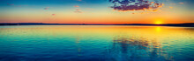 Sunset Over The Lake. Amazing Panorama Landscape