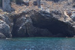 Rock formation out in the azure sea. Azure blue sea coast. Natural view of clear water. Turkish riviera.