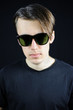 © Disco_Volante - portrait of a young guy on a black background