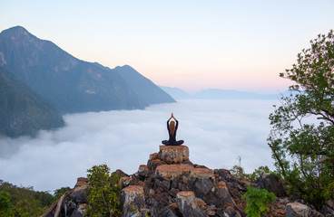 Fotomurali - Serenity and yoga practicing,meditation at mountain range