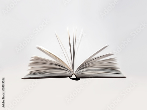 Valokuva Open book, hardback, white sheets on light grey background