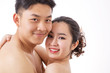 © ddukang - Young happy couple portrait naked on white background