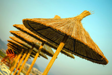 A Straw Umbrella On A Beautiful Tropical Beach
