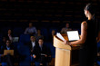 © Wavebreak Media - Female business executive giving a speech