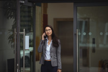 Businesswoman Talking On Mobile Phone