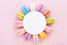 Mockup With Colorful Macaron Or Macaroon On Pink Pastel Background Top View. Flat Lay Composition.