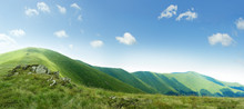 On Top Of Green Carpathian Mountains Range With Blue Sky On A Sunny Day, Empty Landscape Background Of Wide Panorama
