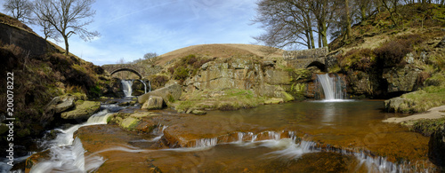 Cuadros en Lienzo Stitched Panoramic view of the Packhorse Bridges at Three Shires Head - where Ch
