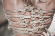 © Natalia - Woman bound with a rope in Japanese technique shibari