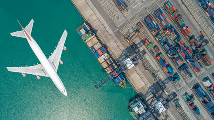 Canvas Print - Container ships and transport aircraft in the export and import business and logistics international goods. Shipping cargo to harbor by crane. Aerial view and top view.