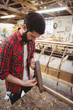 © Wavebreak Media - Man adjusting a hand plane