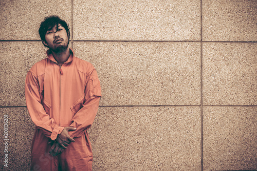 Portrait Of Asian Handsome Man In Prison Uniforms He Has A