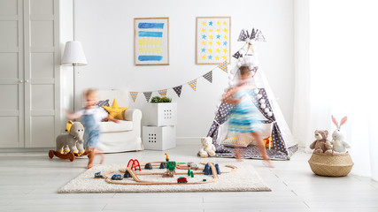 Wall Mural - happy children playing and run  at home in   playroom