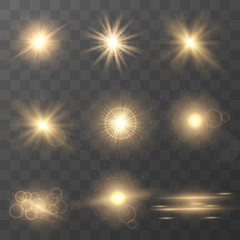 Wall Mural - set of golden glowing lights effects isolated on transparent background. glow light effect. star bur