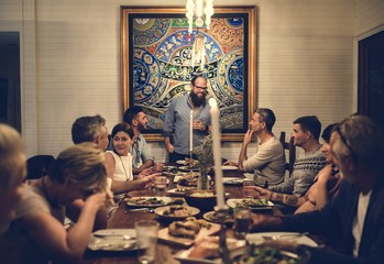 Wall Mural - Group of diverse friends are having a dinner together