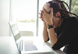 © Wavebreak Media - Stressed woman using laptop