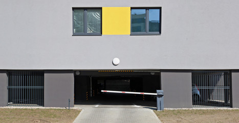 Closed barrier to the first floor of public parking in the modern new home.