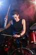© Antonio - Young woman playing drums