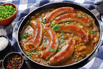 Wall Mural - close-up of juicy fried hot sausages