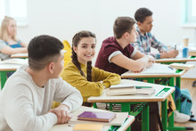 Row Of High School Students Sitting In Class During Lesson