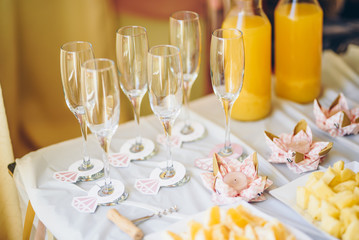 Table setting for a party - champagne glasses and cute decoration